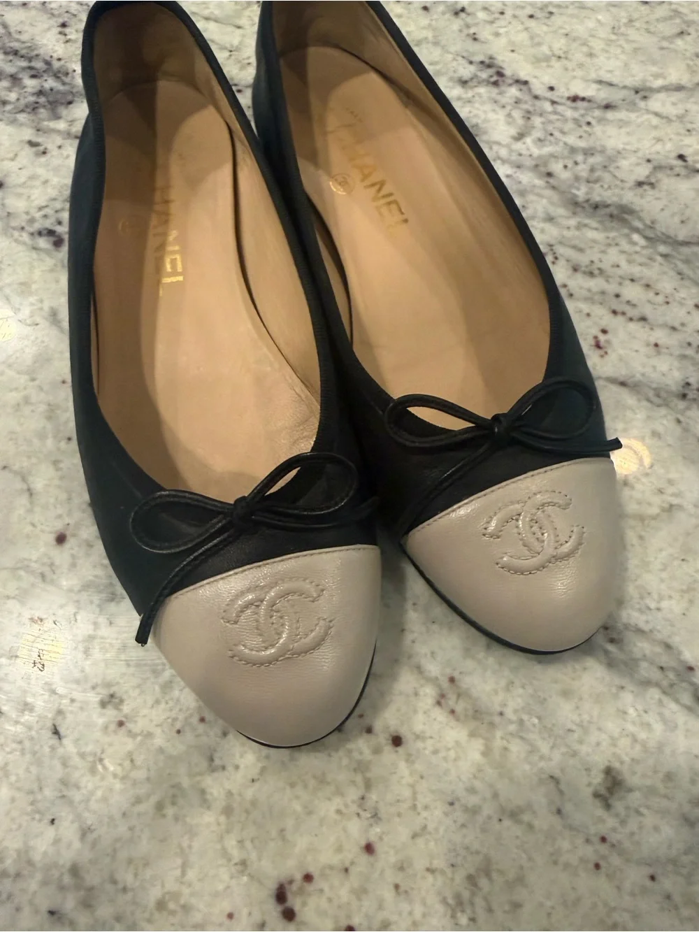 CHANEL Black Leather Ballet Flats with Cream Cap Toe size 7